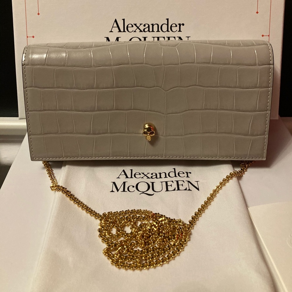 Alexander McQueen gray croc-embossed leather clutch with gold skull hardware
